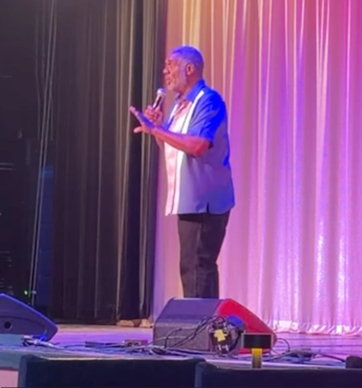 Audience laughing at comedy show